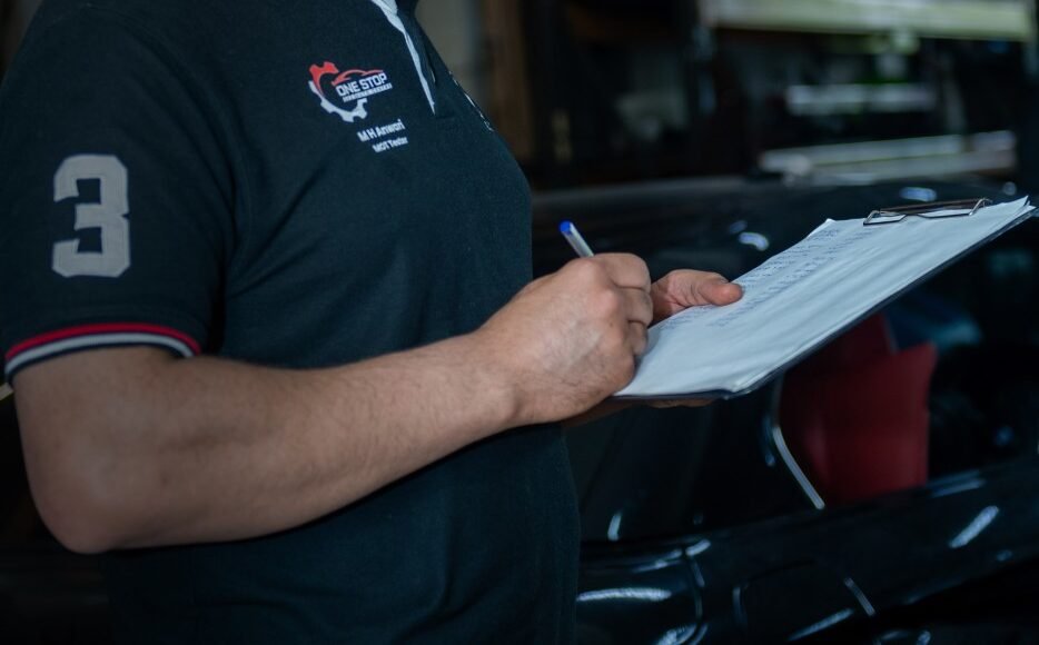 MOT Tester Doing MOT Test